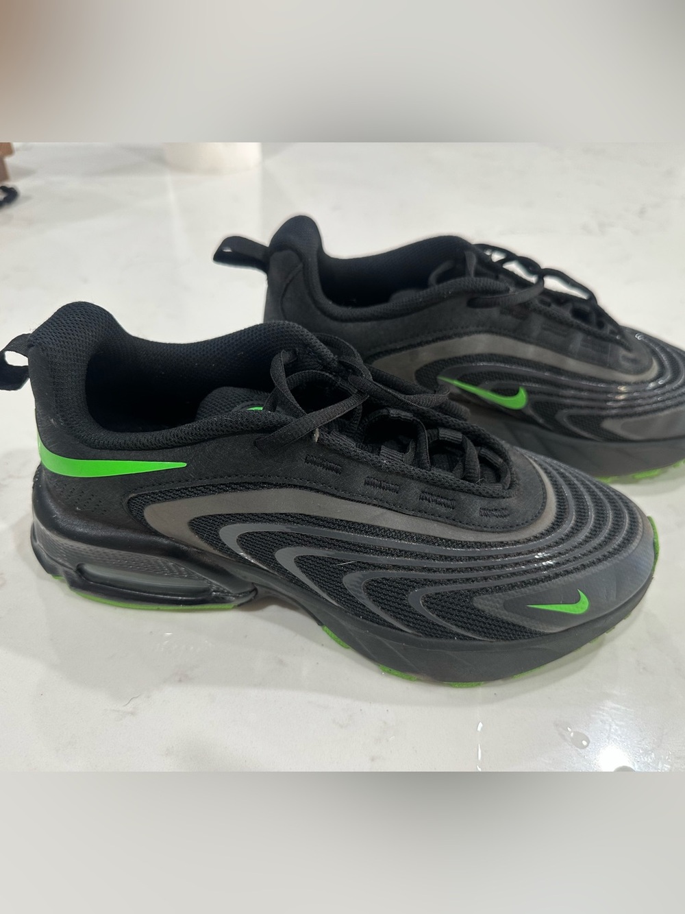 Nike Men’s Black Sneakers with Neon Green Swoosh